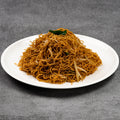 Plate of noodles on a gray background
